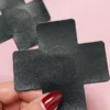 Naughty Thoughts Cross Pasties (5 Pairs) - Leather Black